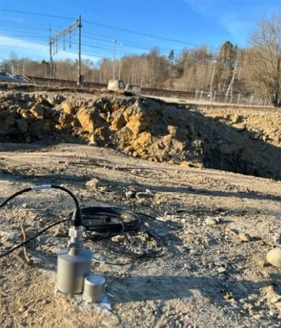 Mätning på frilagt berg på platsen för scenhuset
